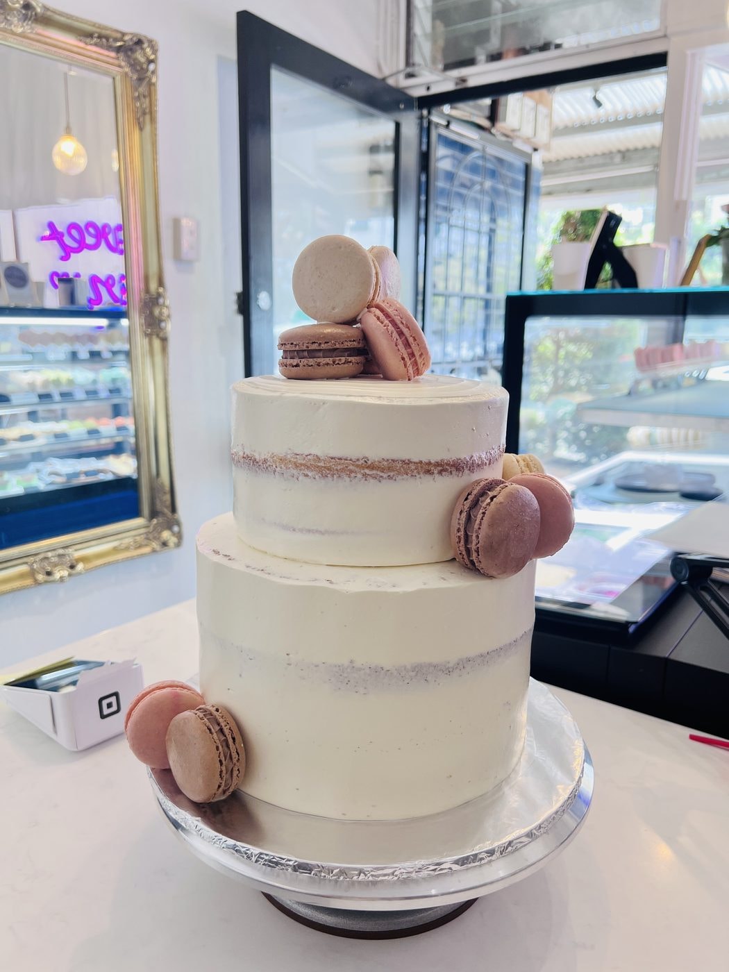 Two-tier cake with macarons